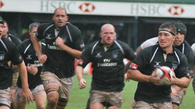 The UAE forwards make progress in a rain-drenched opening Asian Five Nations match in Colombo.