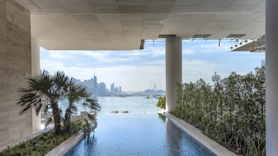 An infinity edge pool has a view to Dubai Marina. Courtesy Gulf Sotheby's International Realty