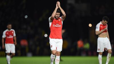 Arsenal’s Olivier Giroud applauds the away supporters after their Premier League win on Saturday at Vicarage Road over Watford. Paul Ellis / AFP