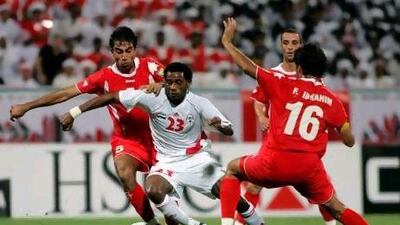 Salem Saad, centre, in action for the UAE national team in a qualifying match against Jordan for the 2007 Asian Cup, died of a heart attack while training with his club, Al Nasr, in 2009. Rabih Moghrabi / AFP