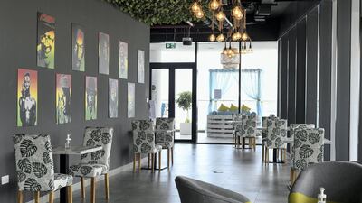 Tables have been spaced out at Kingston 21 Jamaican Restaurant at Al Raha beach. Khushnum Bhandari / The National