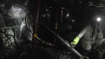 Absent of flash photography the worksite has no light other than miners’ headlamps. Gavin du Venage / The National