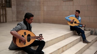 Yemeni music students practice playing the musical instruments during a music class at the Cultural Centre in Sanaa, Yemen. Hani Mohammed / AP Photo