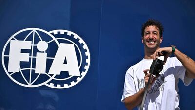 McLaren's Australian driver Daniel Ricciardo arrives at Yas Marina Circuit. AFP