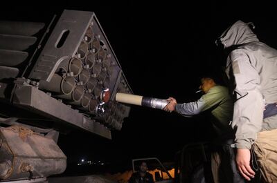 Iraqi paramilitary units from the Hashed Al Shaabi fire rockets from the Iraqi city of Al Qaim towards ISIS positions near Deir Ezzor through the Iraqi-Syrian border on November 11, 2018. AFP