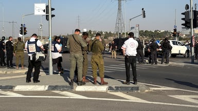 Israeli forces and emergency responders at the scene of what a fatal stabbing attack at Gush Etzion Junction in the occupied West Bank. Reuters