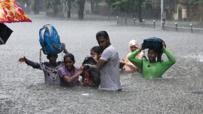 Two thirds of the population of India will impacted by annual floods by 2050 if no action is taken to reduce climate emissions, a new report released on Tuesday said. AP Photo/Rajanish Kakade