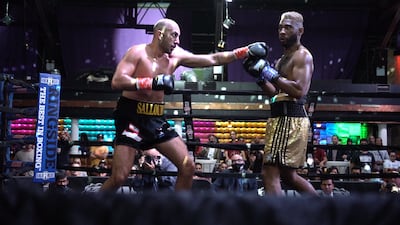 Lebanon Nadim Salloum, left, jabbing his way to a TKO win over Canada's Kenny Chery in Queens, New York on October 8th, 2021. William Nasr for The National
