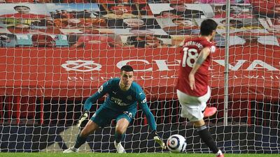 Bruno Fernandes scores the third from the penalty spot. AFP