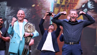 Ali Al Qaisi, left, alongside Jesse Arnett ahead of their UAE Warriors featherweight title fight at the Etihad Arena in Abu Dhabi . Pawan Singh / The National