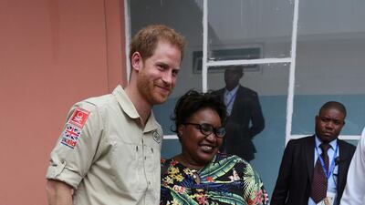 Prince Harry meets a patient during a visit to the Princess Diana Orthopaedic Centre. Reuters