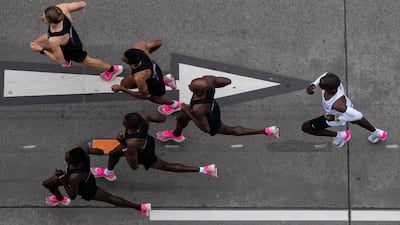 Eliud Kipchoge (in white), Kenyan marathon world record holder, in action next to his pacemakers during the INEOS 1:59 Challenge in Vienna, Austria. Kipchoge attempts to beat his own record becoming the first person to run a marathon in under two hours. EPA