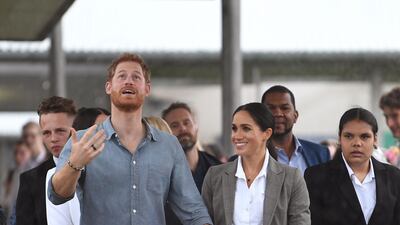 Meghan, Duchess of Sussex, wears a Serena Williams blazer, Maison Kitsune shirt and Outland Denim jeans during a visit to the Dubbo College Senior Campus in Australia on October 17, 2018. AFP