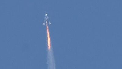 The Virgin Galactic SpaceShipTwo spaceplane 'Unity' and mothership separate as they fly way above Spaceport America, near the city of Truth or Consequences in New Mexico on July 11, 2021 on the way to outer space. AFP