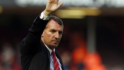 Brendan Rodgers leaves the pitch after Liverpool's season-ending 2-1 win over Newcastle United on Sunday. Phil Noble / Reuters / May 11, 2014