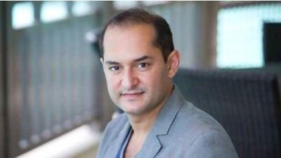 The graphic artist Tarek Atrissi designed the bottle for the Calligraphy perfume. Jaime Puebla / The National