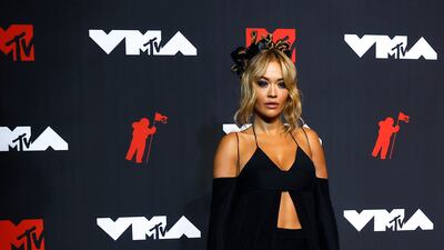 British singer Rita Ora, in Vera Wang, arrives on the MTV Video Music Awards red carpet.