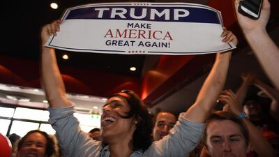 Supporters of US presidential candidate Donald Trump celebrates his seats at the United States Studies Center at the University of Sydney. Australian stocks climbed 0.80 percent at the open in anticipation of a victory for Hillary Clinton in the US presidential election. Saeed Khan / AFP