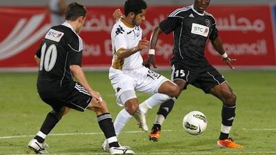 Al Ain's Rami Yaslam, centre, and his teammates will visit Tawam Hospital on National Day.
