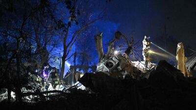 Ukrainian emergency services conduct a search and rescue operation in the rubble of a hotel following a Russian air attack on the town of Kramatorsk. AFP