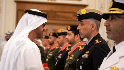 Sheikh Mohamed bin Zayed presents an Emirates Military Medals to members of the UAE Armed Forces, Ministry of Interior and Abu Dhabi Police during a Sea Palace barza.