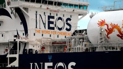 Ineos' logo on the JS Ineon Insight ship as it arrives to dock at Grangemouth in Scotland. Ineos will acquire BP's chemicals business specialising in aromatics and acetyls. AFP