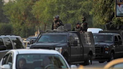 Iraqi patrol in the streets of the capital Baghdad's predominantly Shiite Sadr City. Iraq's parliament held its first session today after a week of anti-government protests that left dozens dead and sparked a political crisis the country's president said required a "national dialogue". AFP