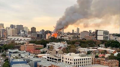 A still from a video posted by Michael Goode on Facebook shows flames engulfing the building. AFP