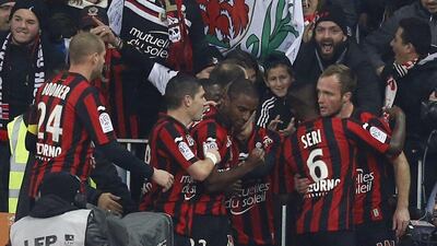 Nice players celebrate a goal in their Ligue 1 match last weekend against Marseille. Valery Hache / AFP / February 14, 2016