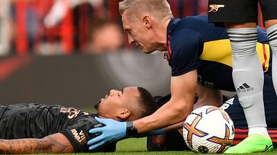 Arsenal's Brazilian striker Gabriel Jesus is treated for a head injury. Reuters