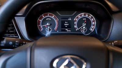 The steering wheel is almost retro, in that it has zero buttons. Victor Besa / The National