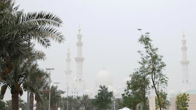 Sheikh Zayed Grand Mosque under hazy skies. Victor Besa / The National