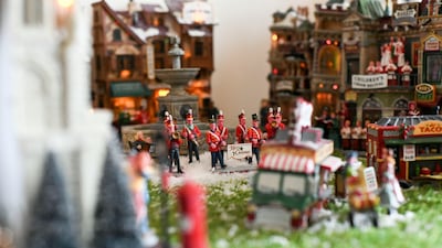 Finally, fake snow is added to cover all the wiring and lend the display a festive feel.