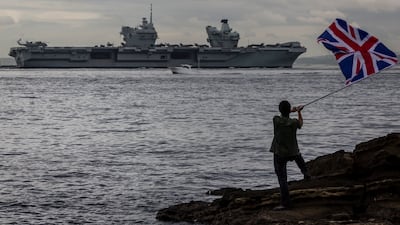 Royal Navy aircraft carrier HMS Queen Elizabeth. Tobias Ellwood has warned Britain must rebuild alliances, consider national service and prepare for how wars will be fought in the future. Getty Images
