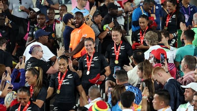 New Zealand players after receiving their winner's medals at The Sevens