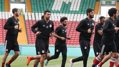 Egypt's forward Mohamed Salah, centre, missed their opening game against Uruguay. Karim Jaafar / AFP