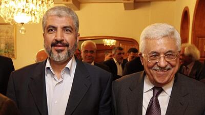 Palestinian Hamas leader Khaled Mashaal, left, and Palestinian president Mahmoud Abbas during their meeting in Cairo. Office of Khaled Meshaal / AP Photo
