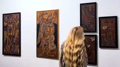 Works from the 1970s by Nigerian painter Twins Seven Seven at Abu Dhabi Art. Victor Besa / The National