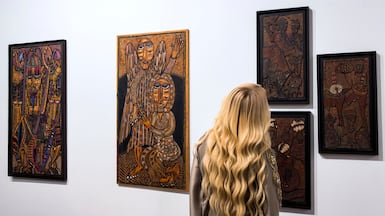 Works from the 1970s by Nigerian painter Twins Seven Seven at Abu Dhabi Art. Victor Besa / The National