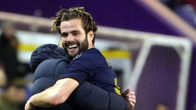 Nacho celebrates his goal with Real Madrid's French coach Zinedine Zidane. AFP