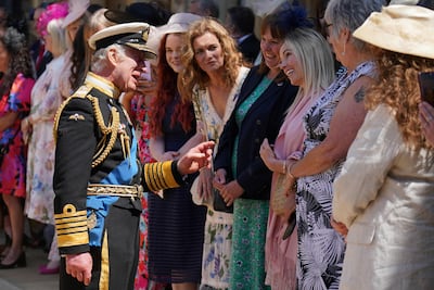 Britain's King Charles III talks to relatives after the ceremony. AFP