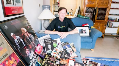 Mark Underwood with his Elton John memorabilia. Reem Mohammed / The National