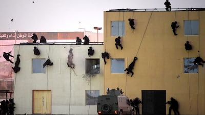 Special forces scaling walls during the graduation parade.Fayez Nureldine/AFP Photo