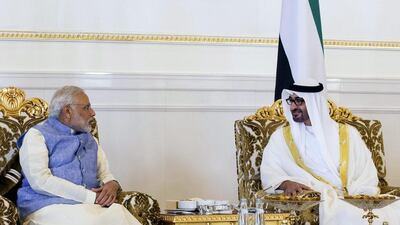 Sheikh Mohammed bin Zayed, Crown Prince of Abu Dhabi and Deputy Supreme Commander of the Armed Forces speaks with Narendra Modi, Prime Minister of India, in August. Ryan Carter / Crown Prince Court - Abu Dhabi