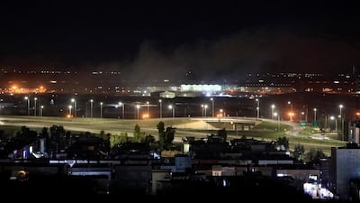 Smoke rises over Erbil, Iraq, where mortar shells reportedly struck close to the airport. Reuters