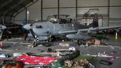 An Afghan Air Force A-29 attack aircraft is pictured inside a hangar at the airport in Kabul, after the US pulled all its troops out of the country, AFP