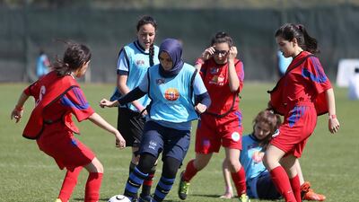 Arowa Dandachi of Al Mawakeb Garhoud school in action against Choueifat school Dubai in the girls under-17 football match in the Dubai School Football Cup. Pawan Singh / The National