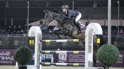 Anna Gorbacheva rides Curt 13 at Fatima bint Mubarak International Showjumping competition. Reem Mohammed / The National