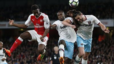 West Ham United's Andy Carroll, right, was driving home from the training ground when the incident occurred. Ian Kington / AFP