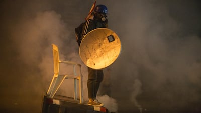 Anti government protesters and riot police clash during a second day of violence. Getty Images